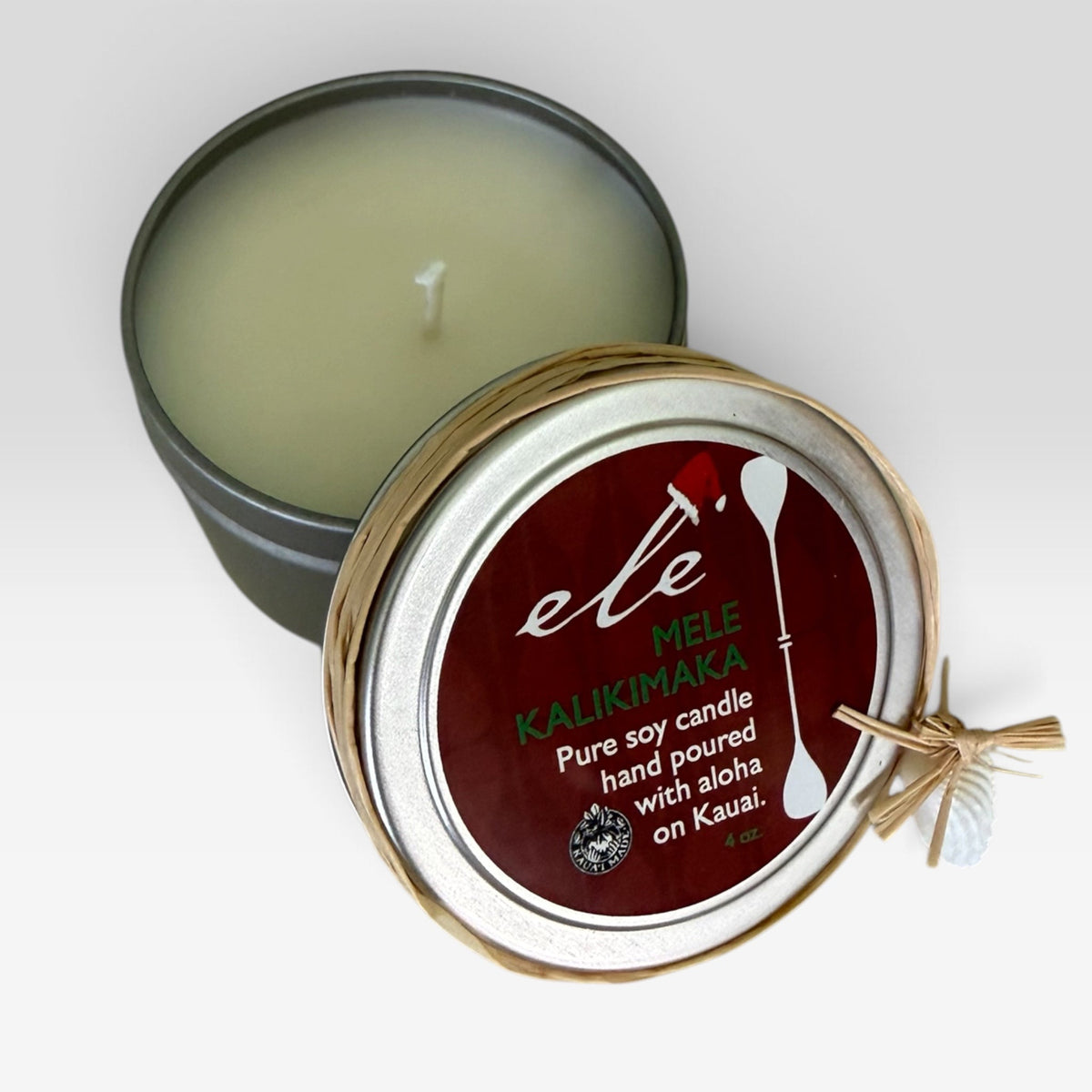 Mele Kalikimaka 4 oz tin candle with lid, raffia and shell