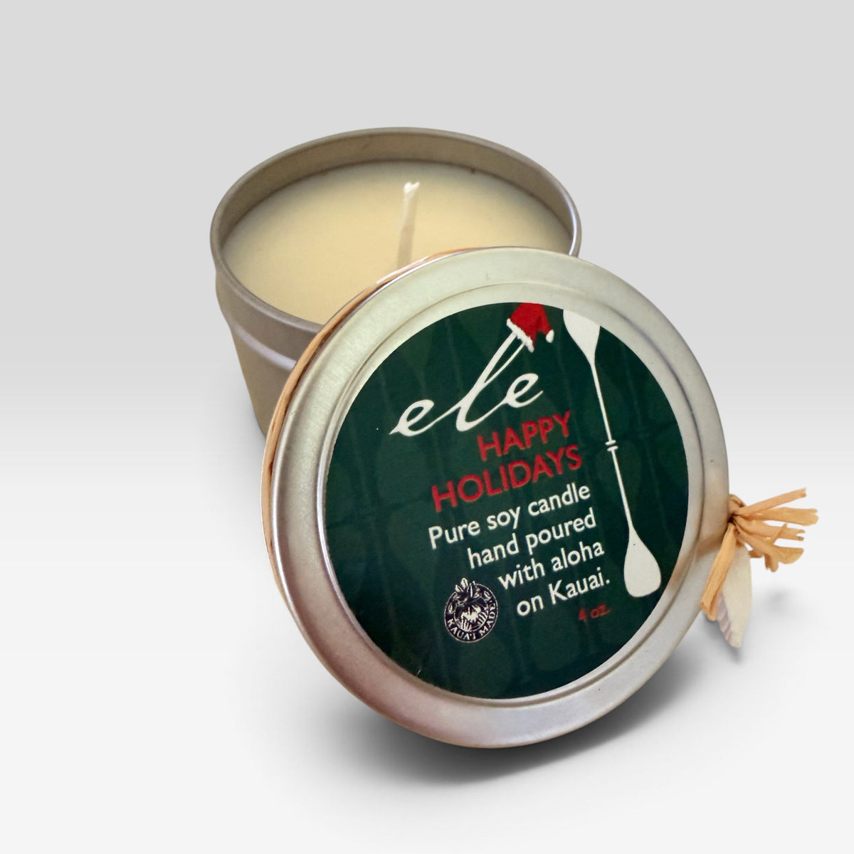 Happy Holidays 4 oz tin soy candle with lid, raffia and shell